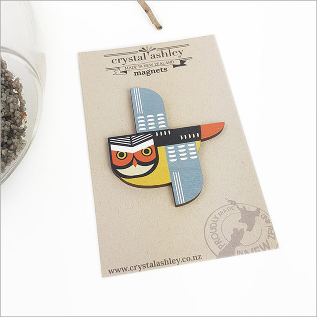 Kiwiana magnet featuring a vibrant Folk Ruru design, perfect for decorating fridges and celebrating New Zealand culture.