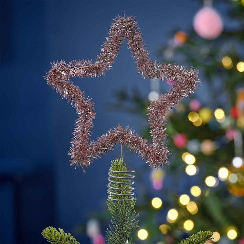 Bright pink tinsel star tree topper, 20cm x 20cm, perfect for adding festive sparkle to your Christmas tree decor.