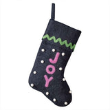 Navy felt Christmas stocking with 'Joy' lettering, green trim, and snowballs, perfect for festive decorations and gifts.