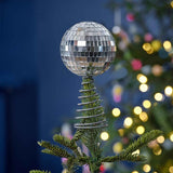 Shimmering silver disco ball tree topper, perfect for adding festive glamour to any Christmas tree.