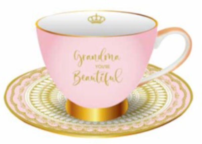 "Charming porcelain tea cup and saucer set with 'Grandma You're Beautiful' message, perfect for elevating tea rituals."