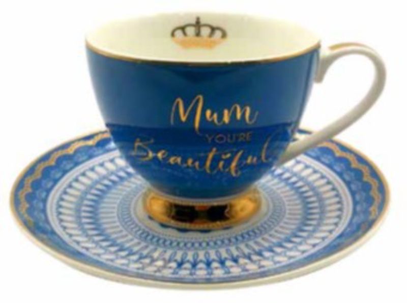 Elegant blue tea cup and saucer with floral design and "Mum You're Beautiful" phrase, perfect for Mother's Day gifts.