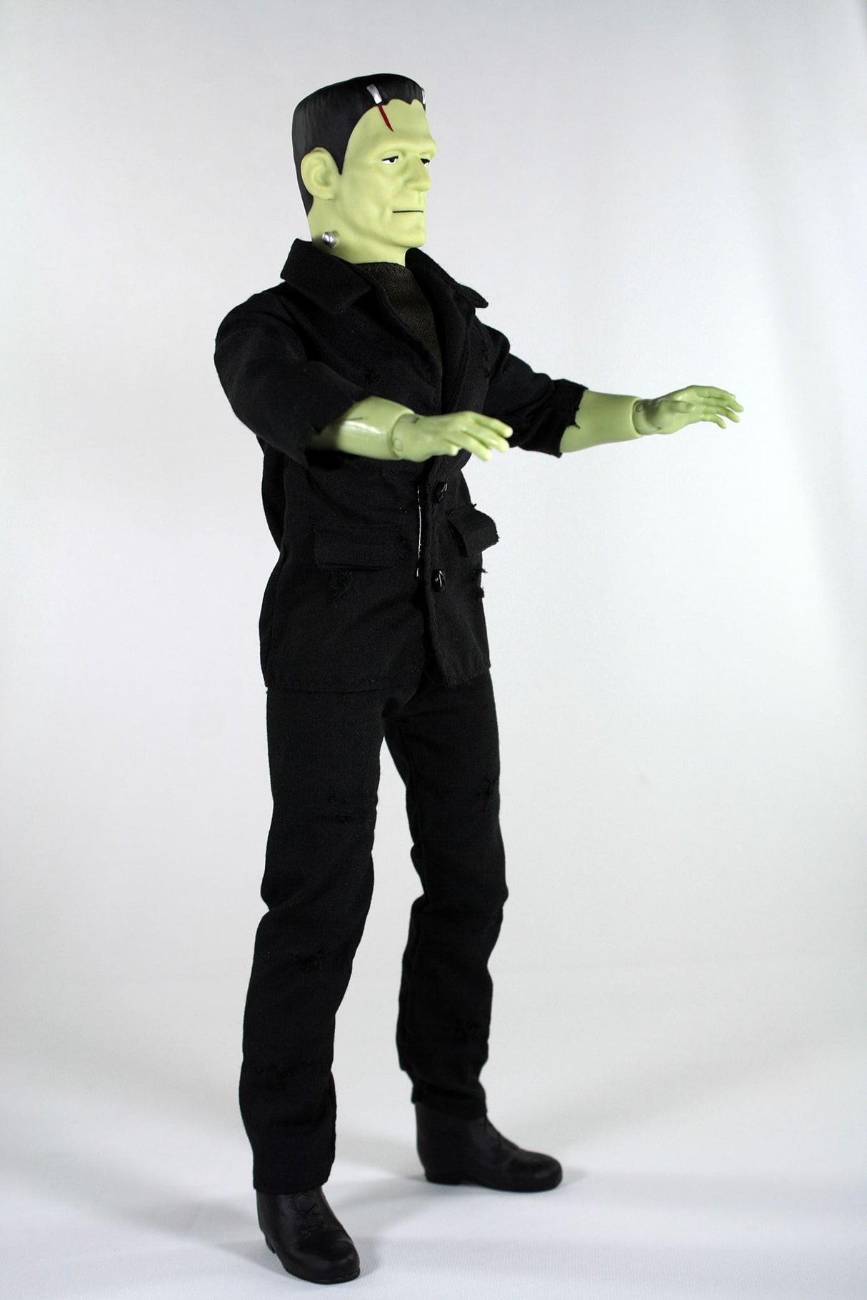 14" Mego Frankenstein figurine captures classic horror with screen-accurate details and 14 points of articulation.