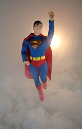 14" Mego Superman figurine, featuring comic-accurate details and 14 points of articulation for dynamic posing and display.