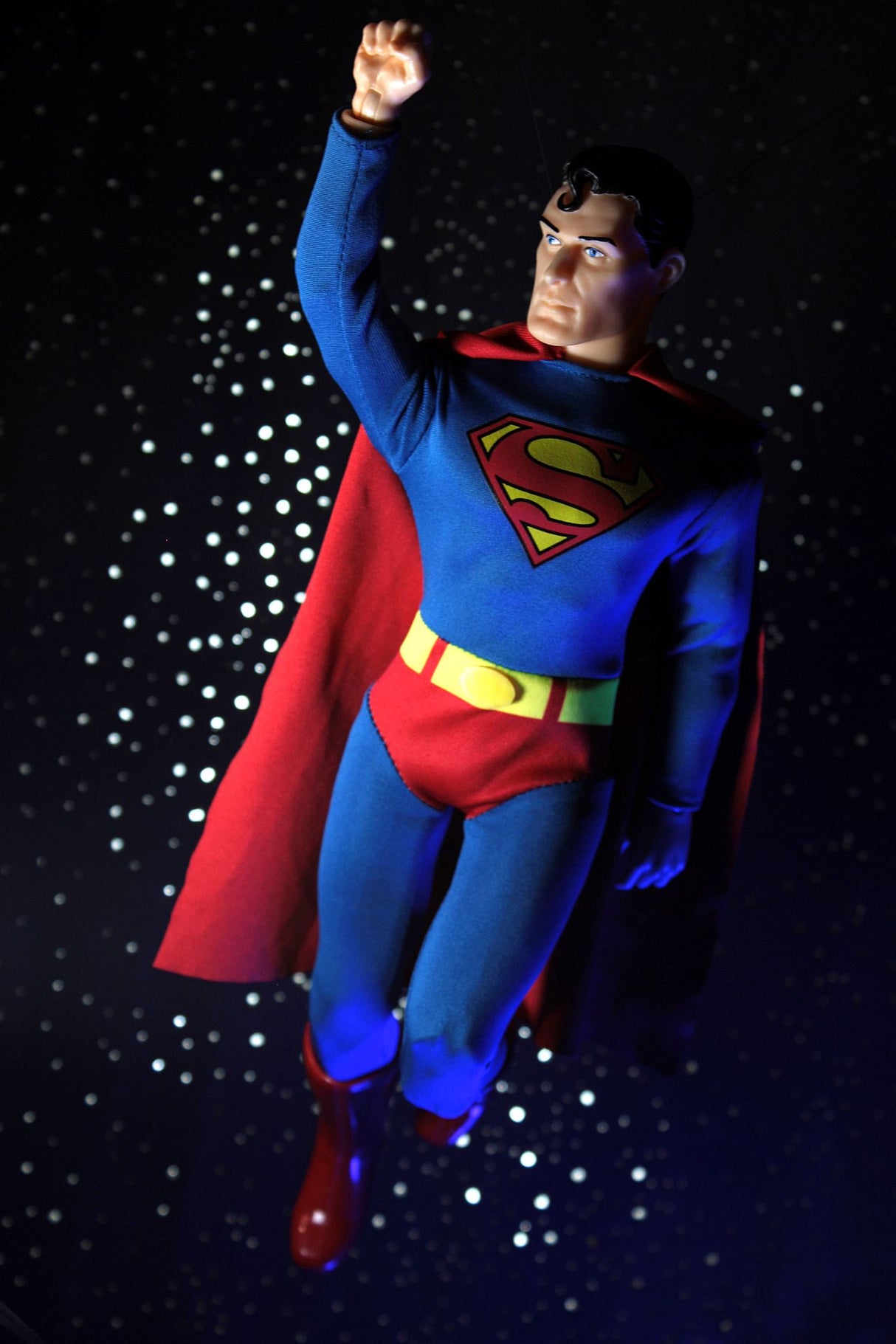 Mego 14" Superman New Wave collectible figurine, featuring comic-accurate details and 14 points of articulation for display and play.