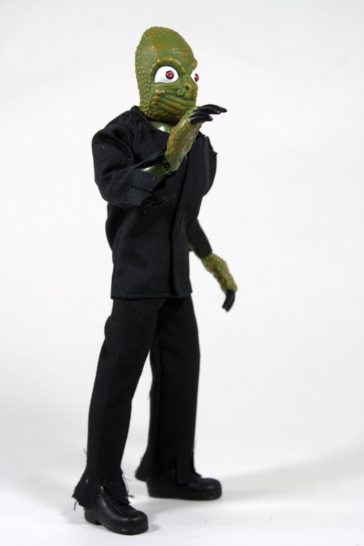 Collectible MEGO 8" Mole People figurine, featuring 14 points of articulation and classic horror film-inspired details.