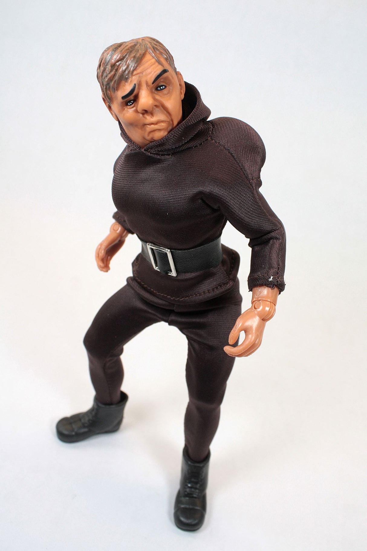 Classic 8" Mego Hunchback action figure with 14 points of articulation, detailed clothing, and a nostalgic design for collectors.