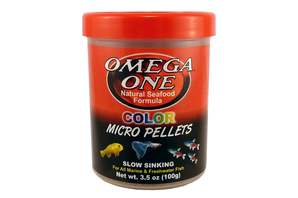 Close-up of Food Fish Omega Colour Mini Pellets, vibrant 0.5mm pellets for enhancing small fish color and health.