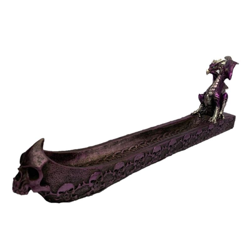 Purple dragon perched on a detailed skull, serving as a striking incense holder and decorative art piece.