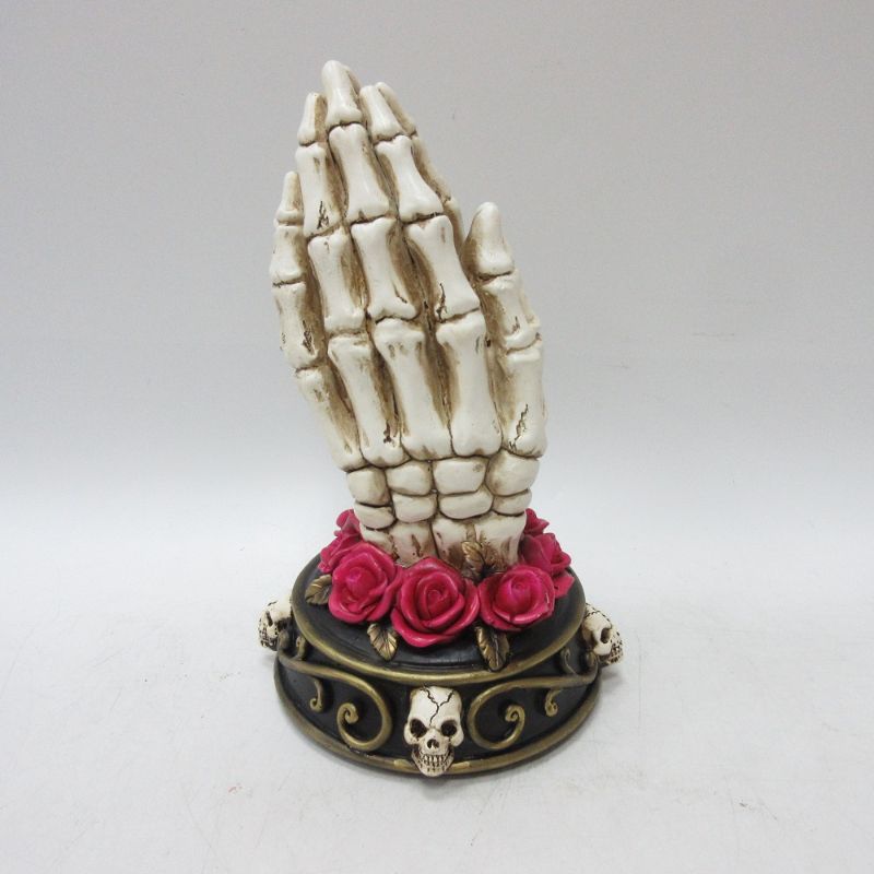 Cream skeleton hand decor, 21.2 cm tall, perfect for gothic-themed interiors or Halloween, adds whimsy and elegance.