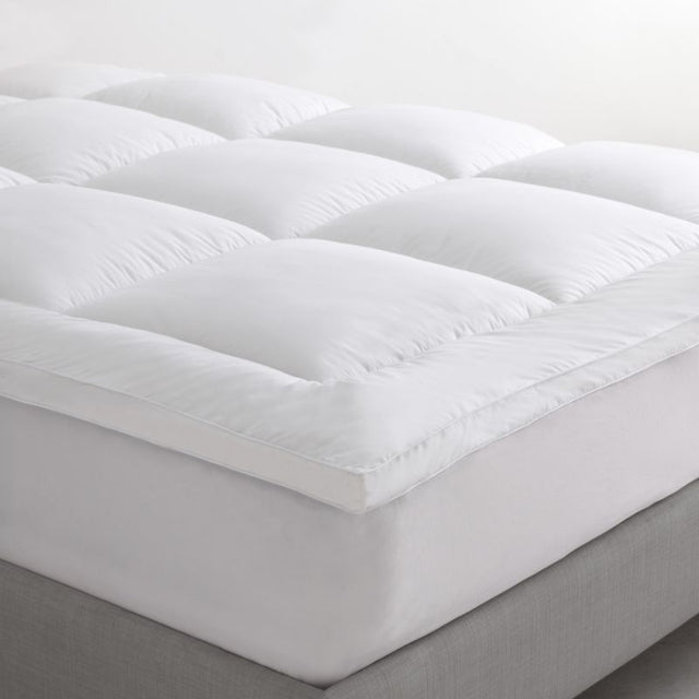 Plush Logan & Mason Pillowtop Mattress Topper for queen beds, featuring 1100gsm microfiber fill and breathable 300TC cotton cover.