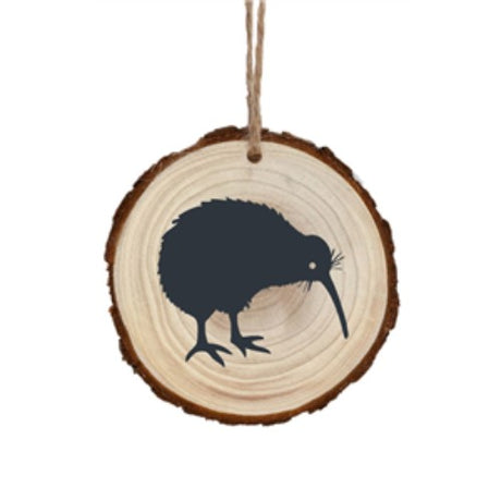 Handcrafted 6cm tree slice art featuring an intricately carved kiwi fruit, celebrating New Zealand's vibrant culture.