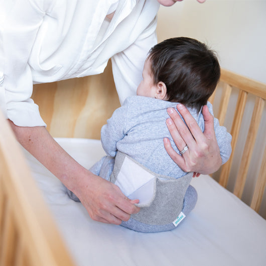 Warm Ease Heated Baby Belt featuring a Moose Owl design, providing soothing warmth and gentle pressure for tummy relief.