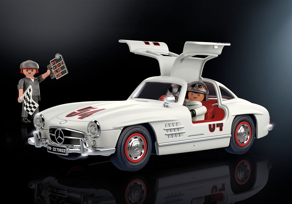 Playmobil Mercedes-Benz 300 SL model featuring gullwing doors, driver and mechanic figures, and racing accessories for imaginative play.