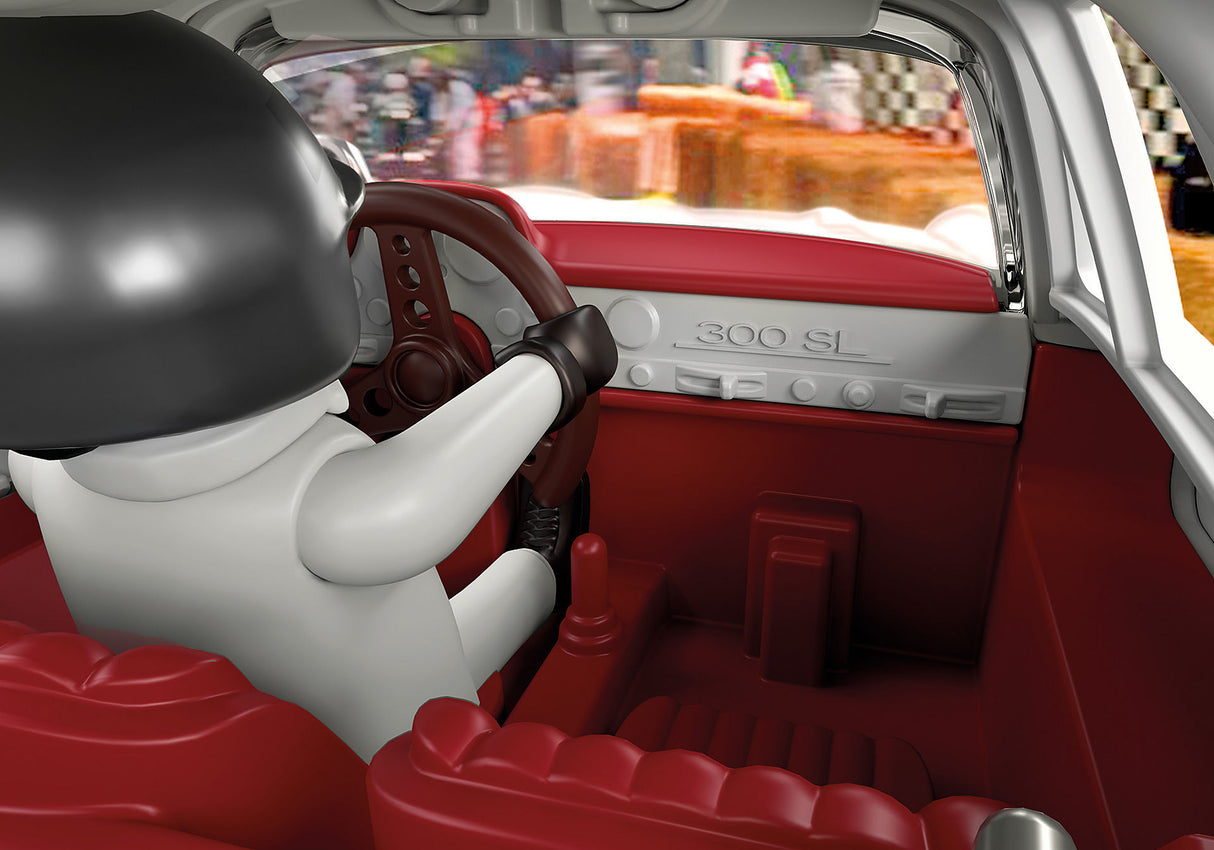 Playmobil Mercedes-Benz 300 SL model with gullwing doors, driver and mechanic figures, and racing accessories for imaginative play.