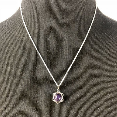 Amethyst Star Protection Pendant featuring a delicate star design, promoting peace, balance, and spiritual growth.