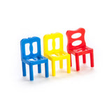 Colorful mini chairs balancing game with shot glasses; a fun party drinking challenge for friends and family.