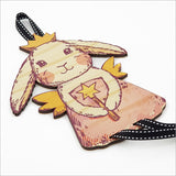 Whimsical Fairy Bunny hairclip organizer made of eco-friendly pine; perfect for tidy storage of kids' hair accessories.
