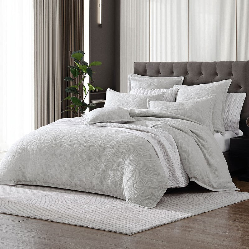 Luxurious Super King Duvet Cover Set in Nara Stone with elegant basket weave pattern, includes cover and two pillowcases.