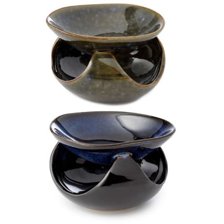 Ceramic oil burners with abstract dark mottled design, 12.5cm wide, perfect for creating calming ambiance in any room.