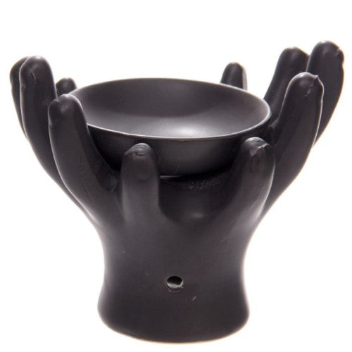 Set of 2 elegant ceramic oil burners with open hands design, perfect for diffusing essential scents in your home.