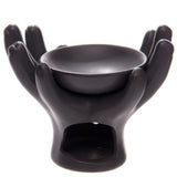 Ceramic oil burners with open hands design, 14cm tall, perfect for creating a soothing aromatic atmosphere.