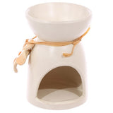 Set of 3 ceramic oil and wax burners in speckled cream with floral designs, ideal for creating soothing home ambiance.