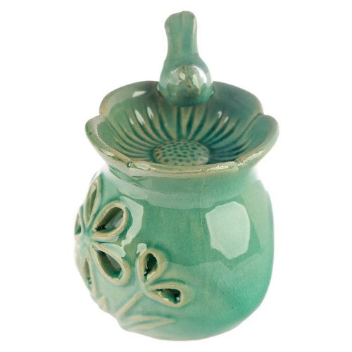 Ceramic oil burners with floral bird bath design, 10.5cm tall, ideal for creating a soothing aromatic atmosphere.