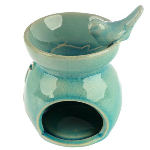 Set of 2 ceramic oil burners featuring a floral bird bath design, perfect for creating a soothing ambiance with essential oils.