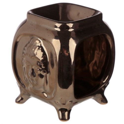 Set of 2 ceramic oil burners with embossed Buddha design, ideal for aromatherapy and home decor. Each measures 10.5cm tall.
