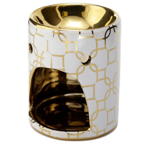 Elegant metallic gold ceramic mini oil burner designed for essential oils, perfect for creating a calming atmosphere at home.