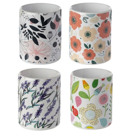 Elegant set of 4 ceramic oil burners with botanical designs for diffusing essential oils and enhancing relaxation.