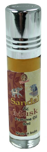 Kamini Perfume Oil Sandal Musk, a luxurious, alcohol-free fragrance with earthy sandalwood notes, perfect for any occasion.