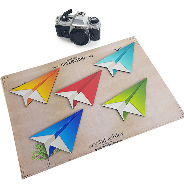 Colorful set of five printed origami planes mounted on durable ACM, perfect for creative wall decor in any space.