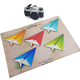 Colorful set of five printed origami planes mounted on durable ACM, perfect for creative wall decor in any space.