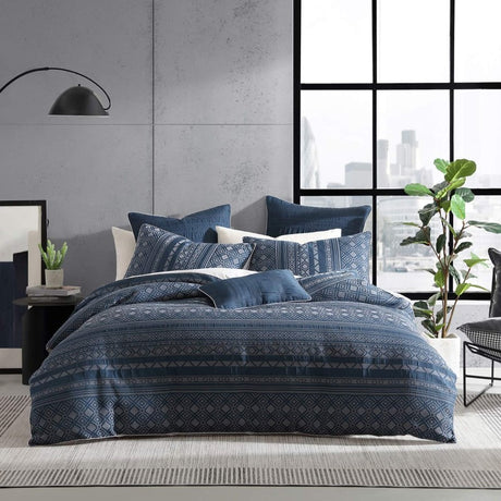 Luxurious Super King Duvet Cover Set featuring geometric and Moroccan patterns in indigo and linen hues by Logan and Mason Platinum.