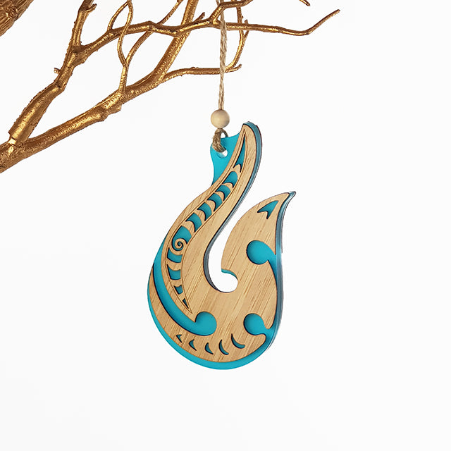 Teal satin acrylic hanging ornament with laser-cut bamboo, perfect for festive decoration and thoughtful gifting.