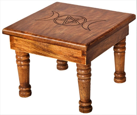 Handcrafted dark mango wood altar table with a pentacle design, ideal for spiritual practices and rituals, measuring 35cm wide.