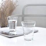 Set of 6 elegant hi ball glasses featuring wave patterns, perfect for serving drinks and stackable for easy storage.