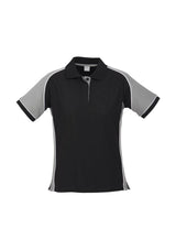 Ladies Nitro Polo in Black/Grey/White, size 16, featuring breathable fabric, contrast panel, and knitted collar for stylish comfort.