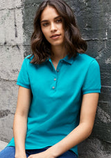 Navy Ladies City Polo (Size 12) showcasing a waffle knit collar, stretch cotton fabric, and UPF 50+ sun protection.