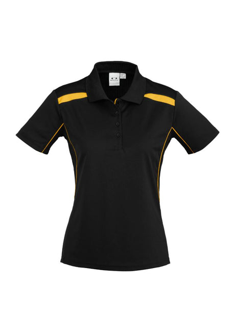 Ladies United Short Sleeve Polo in black and gold, size 12, featuring breathable fabric, contrast panels, and mesh inserts for comfort.