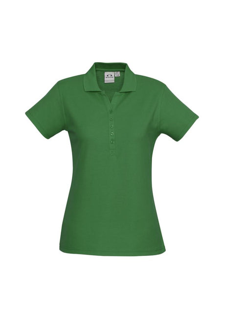 Ladies Crew Polo in Kelly Green, size 14, featuring a Y-placket, flat collar, and durable fabric blend for comfort and style.