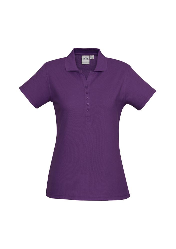Ladies Crew Polo in purple, size 24, featuring a soft cotton-polyester blend, stylish Y-placket, and durable armholes.