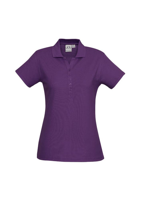 Ladies Crew Polo in purple, size 24, featuring a soft cotton-polyester blend, stylish Y-placket, and durable armholes.