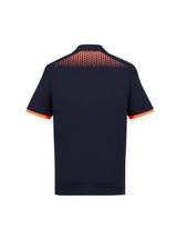 Men's Galaxy Polo in navy and fluoro orange, featuring breathable fabric, antibacterial treatment, and dynamic hexagonal print.