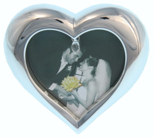 Heart-shaped 3x3 photo frame for displaying cherished memories in a stylish and elegant way. Perfect for any home decor.
