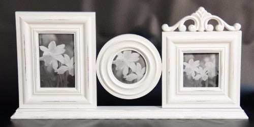 Elegant white multi photo frame with intricate carvings, perfect for displaying cherished family memories.