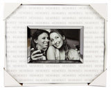 Elegant white and silver photo frame for 6x4 inch pictures, perfect for showcasing cherished memories in any decor.