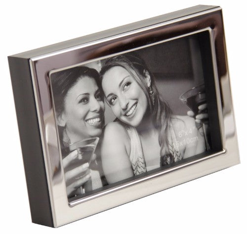 Elegant silver and black depth frame for 4 x 6 photos, perfect for stylishly showcasing memories in any decor.